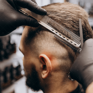 demo-attachment-869-client-doing-hair-cut-barber-shop-salon
