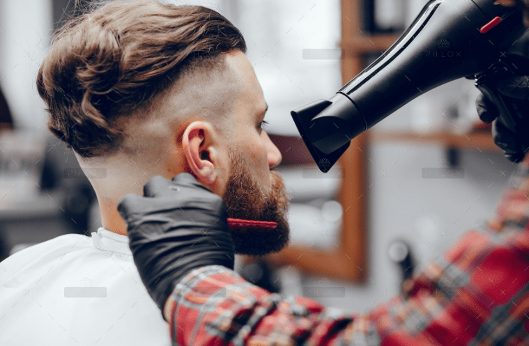 demo-attachment-214-stylish-man-sitting-barbershop